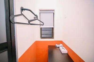 a bathroom with a sink and a mirror at Swing & Pillows - 75 Chulia St, Georgetown Penang in George Town