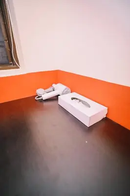 a white box sitting on the floor in a room at Swing & Pillows - 75 Chulia St, Georgetown Penang in George Town
