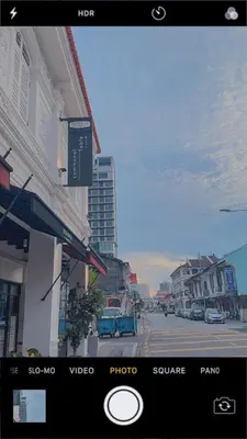 a view from a phone of a city street at Goodnight Homestay in George Town