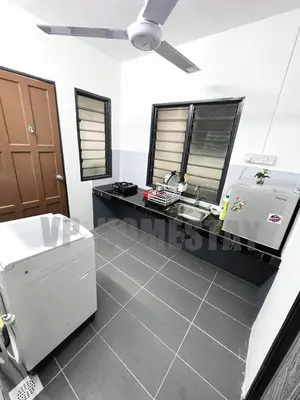 a bathroom with a sink and a bath tub at VP Homestay - Malay Only in Ipoh