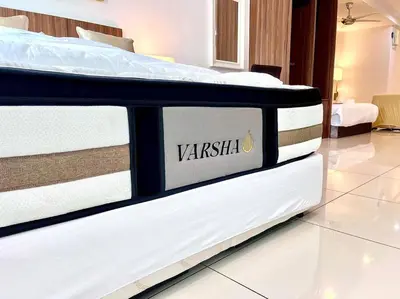a pair of mattresses sitting on top of a bed at Deluxe Studio/Gurney/Mansion One in George Town