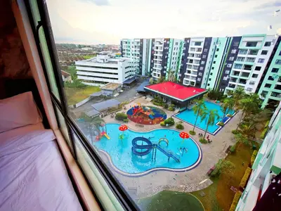 a view from a window of a water park at Ipoh Manhattan Waterpark View 3BR Condo by City Home Empire MHD704 in Ipoh