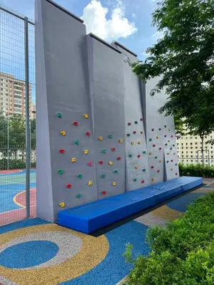 a wall with a climbing wall in a pool at Urban Suites - George Town, Penang in Jelutong