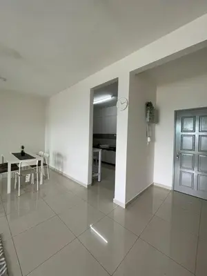 a white room with a table and a door at Rumah Puteh Homestay in Ipoh