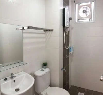 a bathroom with a toilet and a sink at Sekinchan Simple LoveSea House ~ Seaview 3-14AB in Sekincan