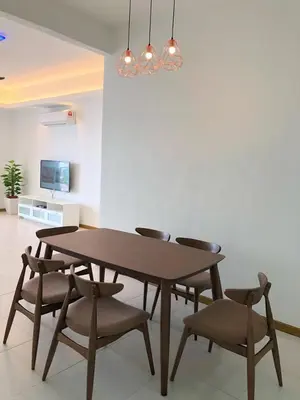a dining room table with chairs and a light fixture at Sekinchan Simple LoveSea House ~ Seaview 3-14AB in Sekincan