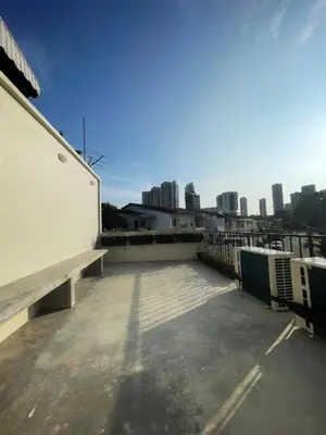 a rooftop of a building with a view of a city at Designer Guesthouse Pulau Tikus & Gurney Drive, Georgetown, Penang in George Town