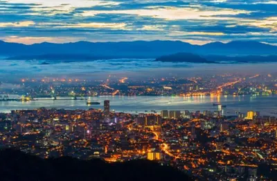 a view of a city at night at Quint Residence, Georgetown - Rustic Heritage Guesthouse by ALV in George Town