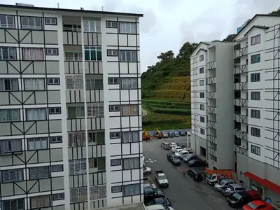 an aerial view of two buildings and a parking lot at Hakimi Homestay in Tanah Rata