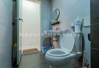 a bathroom with a toilet and a shower with a mirror at Comfy Studio Room by Moowin in Perai