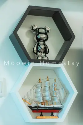 a shelf with a model of a ship at Comfy Studio Room by Moowin in Perai