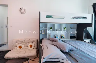 a bedroom with a bed with aokedokedokedokedoked at Comfy Suite by Moowin in Perai