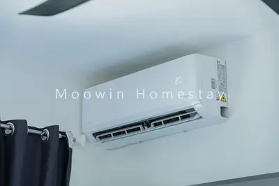 a wall mounted air conditioner in a room at Comfy Suite by Moowin in Perai