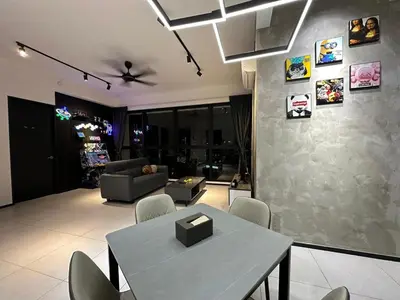 a living room with a table and chairs at 3 Room/3 Queen Bed, Urban Suite Arcade Room #2carpark in Jelutong