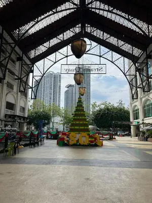 a christmas tree in the middle of a building at Perfect Marina @ Strait Quay /w Exclusive Stay in Tanjong Tokong