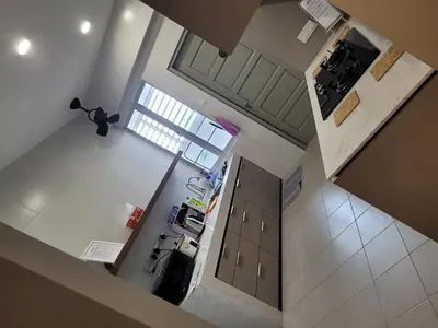 an overhead view of a kitchen with a stove at Venus Cozy Home in Seri Manjung