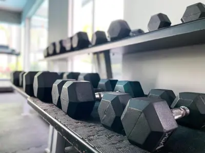 a row of empty seats in a gym at Crystal Cozy Suite PoolView Netflix Waterpark@ Ipoh Station 18 in Ipoh
