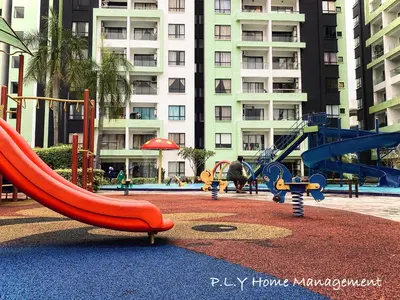 a playground with a slide and a slidesktop at Crystal Cozy Suite PoolView Netflix Waterpark@ Ipoh Station 18 in Ipoh