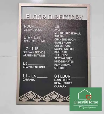 a black sign for a floor directory on a wall at Ojieshome 1BR Sunway Onsen Tambun in Tambun