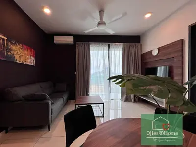 a living room with a couch and a table at Ojieshome 1BR Sunway Onsen Tambun in Tambun