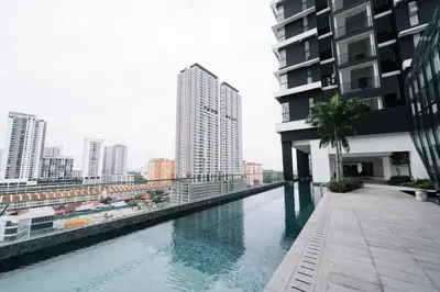 a swimming pool on the side of a building at NEW Infinity Pool Seaview 3Bedrooms 2Carparks 262 in Jelutong