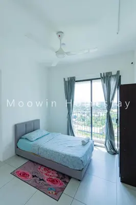 a bedroom with a bed and a large window at Cozy&Comfy Suite Room Perai in Perai
