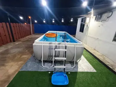 a large bath tub with a ladder next to it at Home MH Casa Damai Private Pool at Sungai Petani in Sungai Petani