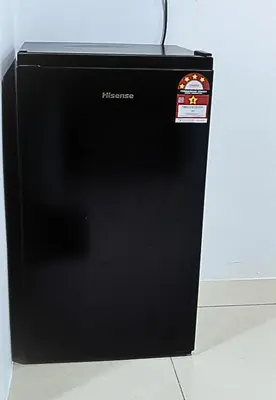 a black refrigerator with a sticker on it at Ipoh Water Park(14pax) Homestay@HopeStay in Ipoh