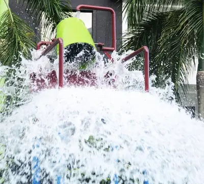 a child on a merry go round in a water park at Ipoh Water Park(14pax) Homestay@HopeStay in Ipoh