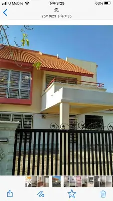 a picture of a house with a black fence at Batu Kawan HS in Simpang Ampat