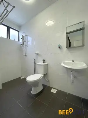 a bathroom with a toilet and a sink at Ipoh Meru Casa Kayangan 3 Bedroom Apartment in Ipoh