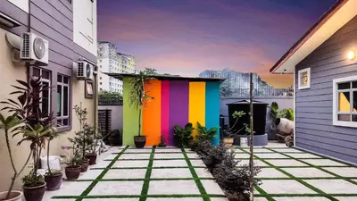 a colorful building on the side of a house at Hidden 5BR Cottage House Retreats (Free Parking) in Butterworth