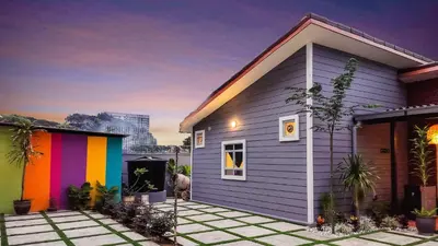 a small house with a rainbow at Hidden 4BR Cottage House Retreats (Free Parking) in Butterworth