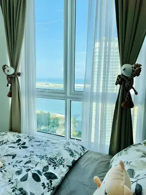 a bedroom with a bed and a large window at Mansion One l 7pax 2R2B l Seaview l Gleneagle l by PerfectSweetHome in George Town