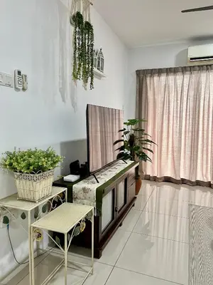 a living room with a bench and plants in it at MyStay IPOH Manhattan waterpark in Ipoh