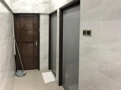 a bathroom with a glass door and a shower at Modern 3 bedrooms House, Walking distance to Kulim Town by Mr Homestay in Kulim