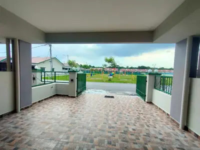 a large empty room with a view of a baseball field at Homestay Fayyadh Teluk Intan 3Room2Bath in Teluk Intan