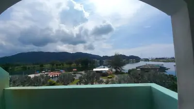 a view from the balcony of a resort at Laguna Apartment 2, Marina Island Homestay in Kampong Batu Gajah