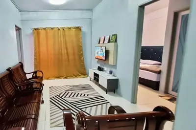 a room with a bedroom with a bed and a television at CH Homestay Tanah Rata, Cameron Highlands, Keyless Entry in Tanah Rata
