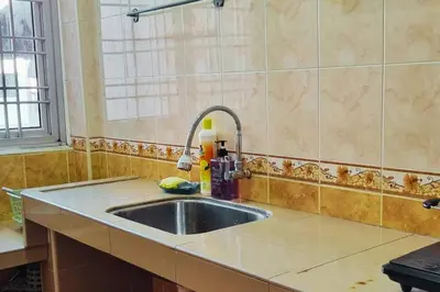a kitchen with a sink and a window at CH Homestay Tanah Rata, Cameron Highlands, Keyless Entry in Tanah Rata