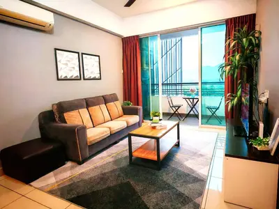 a living room with a couch and a table at Ipoh City Centre Majestic 2 Room Condo near Gerbang Malam by City Home Empire in Ipoh