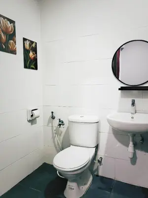 a bathroom with a toilet and a sink at Ipoh City Centre Majestic 2 Room Condo near Gerbang Malam by City Home Empire in Ipoh