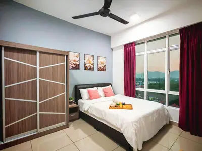 a bedroom with a bed and a large window at Ipoh City Centre Majestic 2 Room Condo near Gerbang Malam by City Home Empire in Ipoh