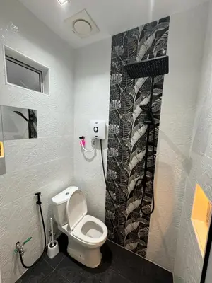 a bathroom with a toilet and a shower at Stylish Balinimo Guest room - King Bed, Free Netflix, Prime & Wi-Fi Near Bukit Mertajam in Kubang Semang