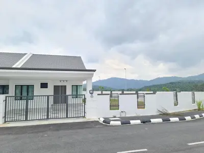 a white house with a gate and a driveway at White Sweet Homestay, Kulim Hi-Tech Park Kedah in Kulim