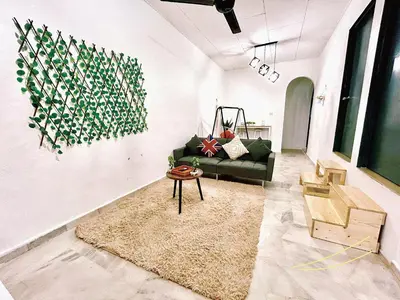 a living room with a couch and a table at Home39#4pax#jpnstyle#netflix#NearIconCity in Bukit Mertajam