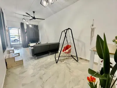 a living room with a couch and a swing at Home39#4pax#jpnstyle#netflix#NearIconCity in Bukit Mertajam