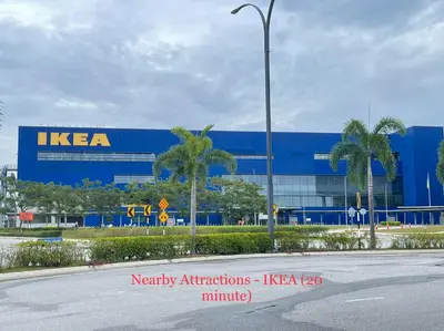 a kera building with palm trees in front of a street at Home39#4pax#jpnstyle#netflix#NearIconCity in Bukit Mertajam