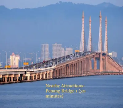 a bridge over the water with cars on it at Home39#4pax#jpnstyle#netflix#NearIconCity in Bukit Mertajam