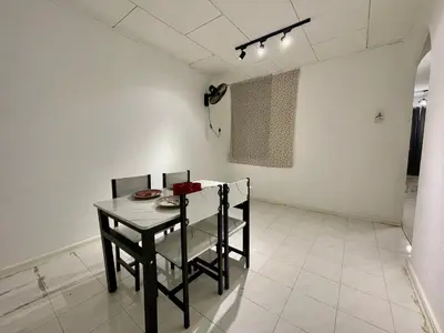 a dining room with a table and chairs at Home39#4pax#jpnstyle#netflix#NearIconCity in Bukit Mertajam